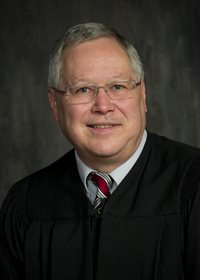 Senior Judge Steven R. Schwab