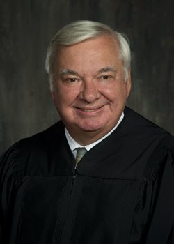 Senior Judge Terrence M. Walters