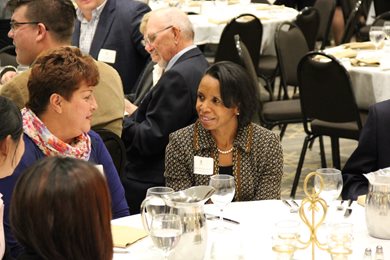 Supreme Court Justice Wilhelmina Wright talks with a member of the Worthington Community at dinner on Sept. 30