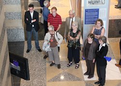 Members of the public viewing the Magna Carta exhibit video