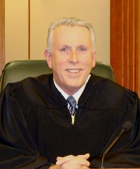Senior Judge Lawrence F. Clark