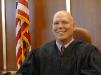 Senior Judge John C. Hoffman