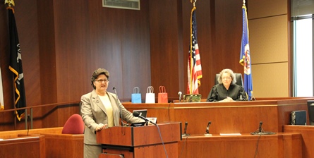 Second Judicial District Chief Judge Teresa R. Warner speaks at the graduation presided over by Second Judicial District Judge Judith M. Tilsen.