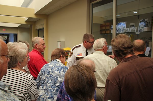 A group of visitors take a tour of the Dodge County Courthouse