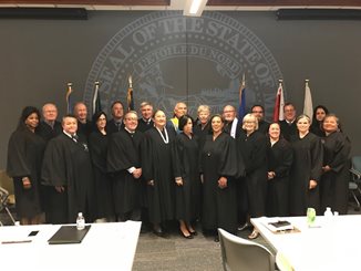 June 25, 2019 ceremony where four Dakota Communities gave tribal flags to Hennepin and Scott County District Courts.