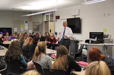 Justice David Lillehaug speaking to a class at Alexandria Area High School