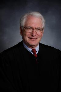 Senior Judge Ronald L. Abrams